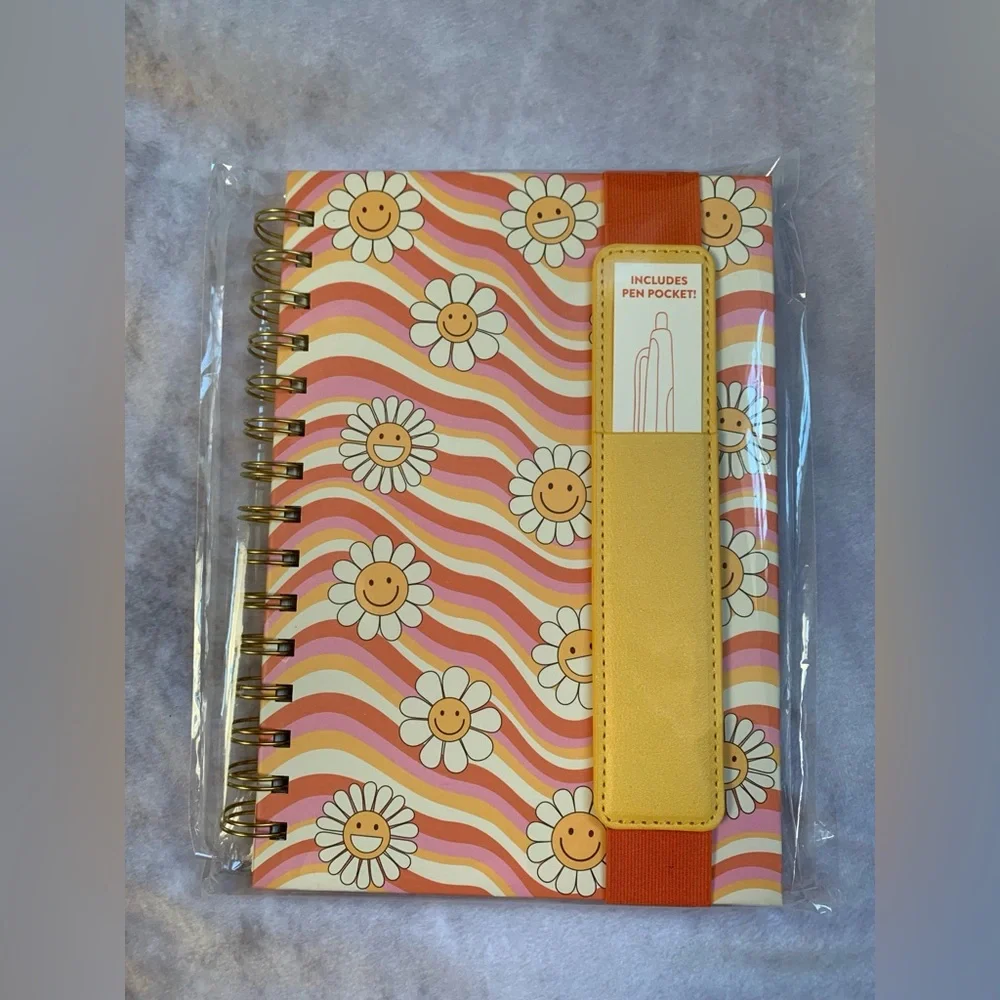 Waves of Melody Oliver Notebook with Pen Pocket. In original packaging.